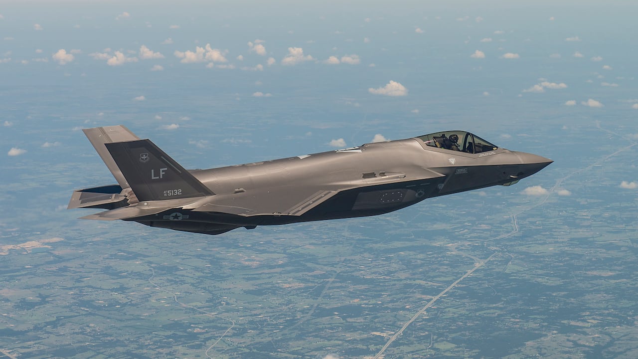 A fighter jet flying in the sky.