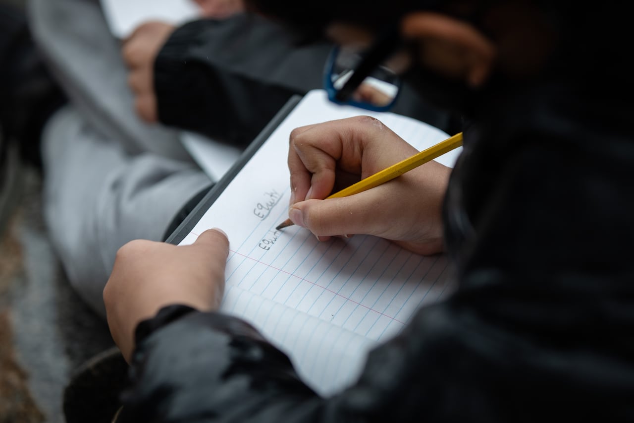 Student writes about equity during class at Reimer Middle School in Abbotsford, B.C., on Thursday, November 26, 2020. (Maggie MacPherson/CBC)