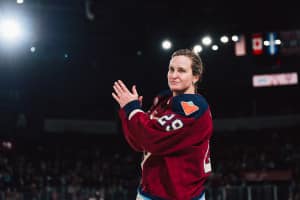 A woman claps.